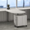 i5 Industries Close Up Mobile Pedestal in a coastal open office plan under a desk